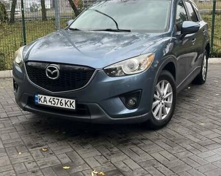 Синий Мазда СХ-5, объемом двигателя 2.5 л и пробегом 142 тыс. км за 13400 $, фото 1 на Automoto.ua
