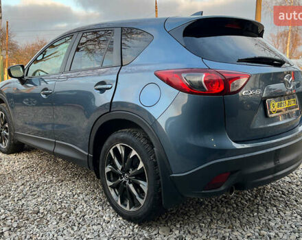 Синий Мазда СХ-5, объемом двигателя 2.49 л и пробегом 170 тыс. км за 16500 $, фото 4 на Automoto.ua