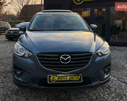 Синий Мазда СХ-5, объемом двигателя 2.49 л и пробегом 170 тыс. км за 16500 $, фото 1 на Automoto.ua