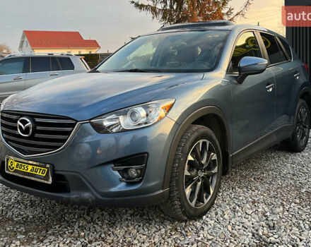 Синий Мазда СХ-5, объемом двигателя 2.49 л и пробегом 170 тыс. км за 16500 $, фото 2 на Automoto.ua