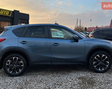 Синий Мазда СХ-5, объемом двигателя 2.49 л и пробегом 170 тыс. км за 16500 $, фото 7 на Automoto.ua