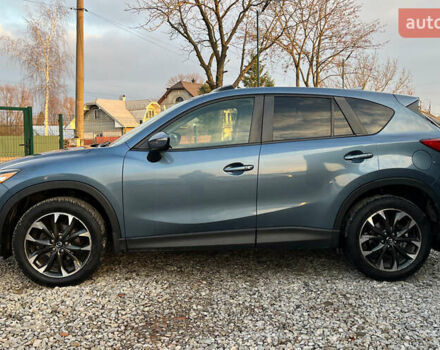 Синий Мазда СХ-5, объемом двигателя 2.49 л и пробегом 170 тыс. км за 16500 $, фото 3 на Automoto.ua