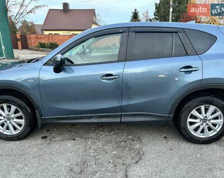 Синий Мазда СХ-5, объемом двигателя 2.49 л и пробегом 122 тыс. км за 15500 $, фото 1 на Automoto.ua