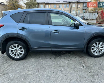 Синий Мазда СХ-5, объемом двигателя 2.49 л и пробегом 122 тыс. км за 15500 $, фото 4 на Automoto.ua