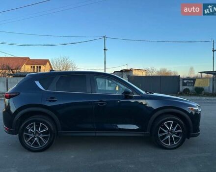 Синий Мазда СХ-5, объемом двигателя 2.5 л и пробегом 140 тыс. км за 18500 $, фото 6 на Automoto.ua