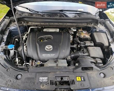 Синий Мазда СХ-5, объемом двигателя 2.5 л и пробегом 107 тыс. км за 11000 $, фото 6 на Automoto.ua
