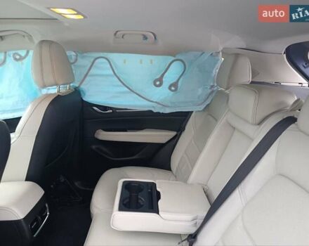 Синий Мазда СХ-5, объемом двигателя 2.5 л и пробегом 107 тыс. км за 11000 $, фото 5 на Automoto.ua