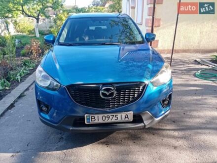 Синий Мазда СХ-5, объемом двигателя 2 л и пробегом 210 тыс. км за 12000 $, фото 1 на Automoto.ua