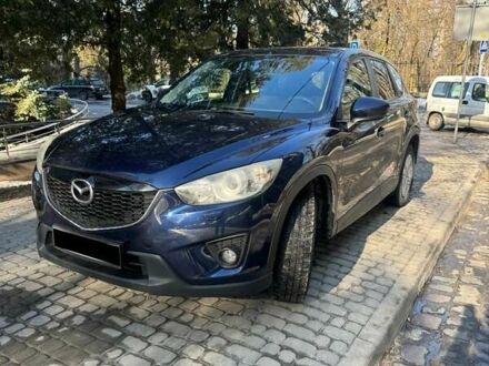 Синий Мазда СХ-5, объемом двигателя 2 л и пробегом 228 тыс. км за 11300 $, фото 1 на Automoto.ua