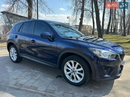 Синий Мазда СХ-5, объемом двигателя 2.19 л и пробегом 179 тыс. км за 12500 $, фото 1 на Automoto.ua