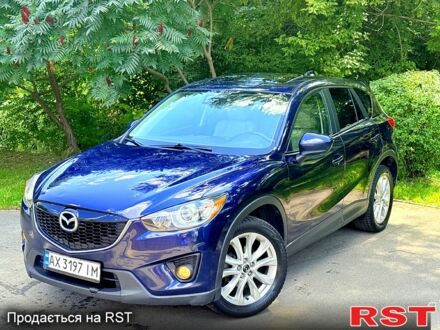 Синий Мазда СХ-5, объемом двигателя 2.5 л и пробегом 189 тыс. км за 11950 $, фото 1 на Automoto.ua