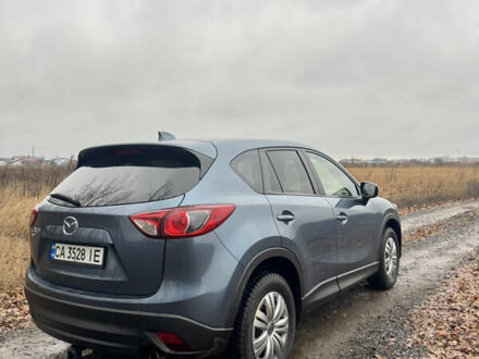 Синий Мазда СХ-5, объемом двигателя 2.49 л и пробегом 118 тыс. км за 13200 $, фото 1 на Automoto.ua