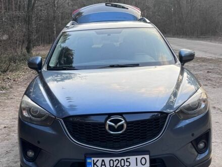 Синий Мазда СХ-5, объемом двигателя 2.49 л и пробегом 165 тыс. км за 12500 $, фото 1 на Automoto.ua