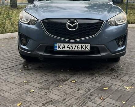 Синий Мазда СХ-5, объемом двигателя 2.5 л и пробегом 142 тыс. км за 13400 $, фото 1 на Automoto.ua