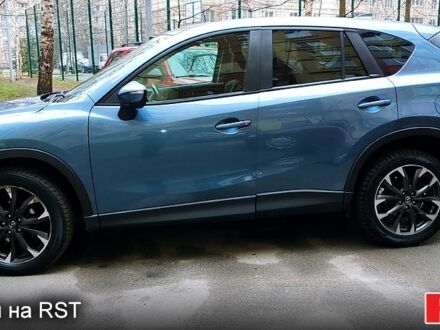 Синий Мазда СХ-5, объемом двигателя 2.5 л и пробегом 130 тыс. км за 15000 $, фото 1 на Automoto.ua