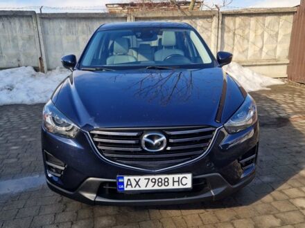 Синий Мазда СХ-5, объемом двигателя 2.5 л и пробегом 238 тыс. км за 14800 $, фото 1 на Automoto.ua