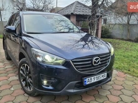 Синий Мазда СХ-5, объемом двигателя 2.19 л и пробегом 145 тыс. км за 15500 $, фото 1 на Automoto.ua
