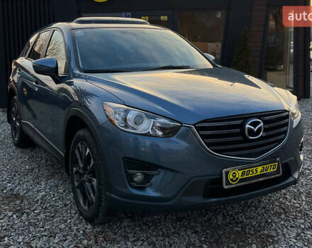 Синий Мазда СХ-5, объемом двигателя 2.49 л и пробегом 170 тыс. км за 16500 $, фото 1 на Automoto.ua