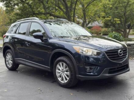 Синий Мазда СХ-5, объемом двигателя 2.5 л и пробегом 79 тыс. км за 10300 $, фото 1 на Automoto.ua