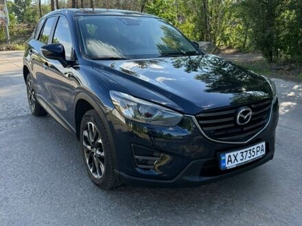 Синий Мазда СХ-5, объемом двигателя 2.19 л и пробегом 169 тыс. км за 15500 $, фото 1 на Automoto.ua