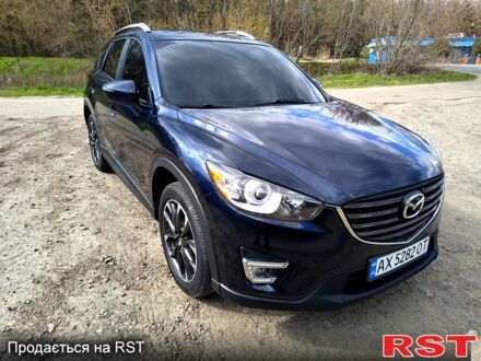 Синий Мазда СХ-5, объемом двигателя 2.5 л и пробегом 93 тыс. км за 16500 $, фото 1 на Automoto.ua