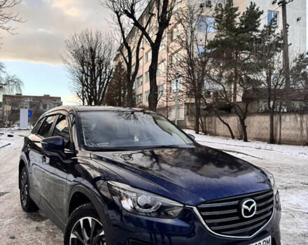 Синий Мазда СХ-5, объемом двигателя 2.49 л и пробегом 143 тыс. км за 16900 $, фото 1 на Automoto.ua