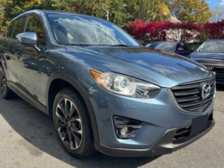 Синий Мазда СХ-5, объемом двигателя 2.5 л и пробегом 80 тыс. км за 11950 $, фото 1 на Automoto.ua
