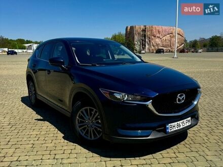 Синий Мазда СХ-5, объемом двигателя 2.49 л и пробегом 170 тыс. км за 16500 $, фото 1 на Automoto.ua