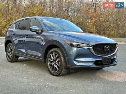 Синий Мазда СХ-5, объемом двигателя 2.5 л и пробегом 137 тыс. км за 17000 $, фото 1 на Automoto.ua