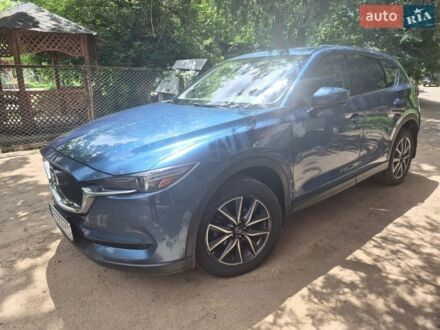 Синий Мазда СХ-5, объемом двигателя 2.49 л и пробегом 139 тыс. км за 17100 $, фото 1 на Automoto.ua