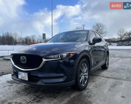 Синий Мазда СХ-5, объемом двигателя 2.49 л и пробегом 140 тыс. км за 21800 $, фото 1 на Automoto.ua