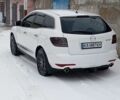 Белый Мазда СХ-7, объемом двигателя 2.5 л и пробегом 286 тыс. км за 10200 $, фото 1 на Automoto.ua