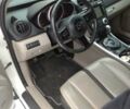 Белый Мазда СХ-7, объемом двигателя 2.26 л и пробегом 140 тыс. км за 7000 $, фото 2 на Automoto.ua