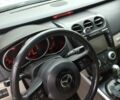 Белый Мазда СХ-7, объемом двигателя 2.26 л и пробегом 140 тыс. км за 7000 $, фото 3 на Automoto.ua