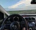 Белый Мазда СХ-7, объемом двигателя 2.3 л и пробегом 178 тыс. км за 8400 $, фото 2 на Automoto.ua