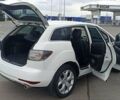 Белый Мазда СХ-7, объемом двигателя 2.26 л и пробегом 193 тыс. км за 8500 $, фото 15 на Automoto.ua