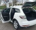 Белый Мазда СХ-7, объемом двигателя 2.26 л и пробегом 193 тыс. км за 8500 $, фото 16 на Automoto.ua