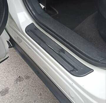 Белый Мазда СХ-7, объемом двигателя 2.26 л и пробегом 193 тыс. км за 8500 $, фото 18 на Automoto.ua