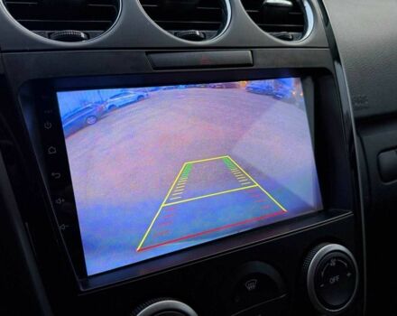 Білий Мазда СХ-7, об'ємом двигуна 2.2 л та пробігом 226 тис. км за 9690 $, фото 21 на Automoto.ua