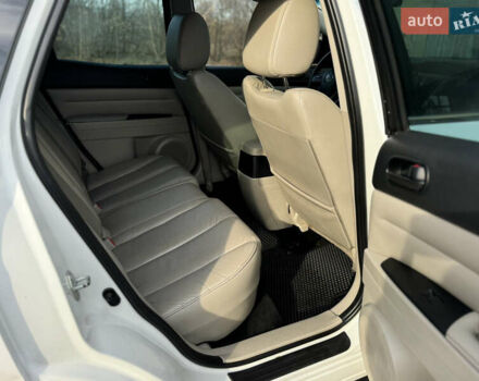 Білий Мазда СХ-7, об'ємом двигуна 2.49 л та пробігом 350 тис. км за 8200 $, фото 33 на Automoto.ua