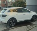Белый Мазда СХ-7, объемом двигателя 2.18 л и пробегом 250 тыс. км за 9400 $, фото 1 на Automoto.ua