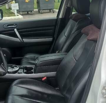 Белый Мазда СХ-7, объемом двигателя 2.26 л и пробегом 193 тыс. км за 8500 $, фото 38 на Automoto.ua