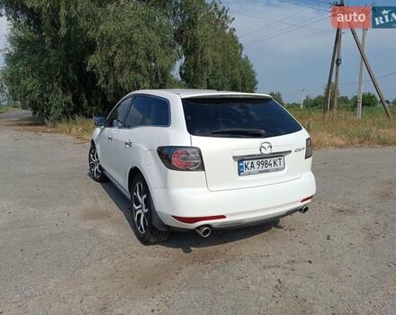 Белый Мазда СХ-7, объемом двигателя 2.26 л и пробегом 219 тыс. км за 8900 $, фото 5 на Automoto.ua