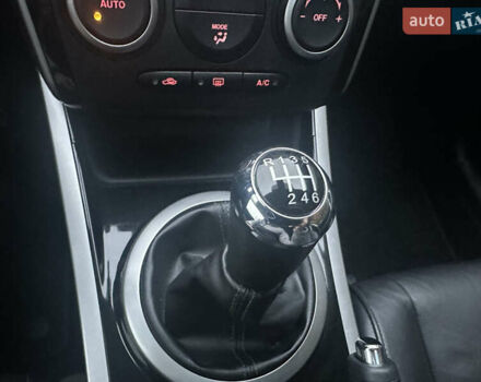 Білий Мазда СХ-7, об'ємом двигуна 2.2 л та пробігом 243 тис. км за 10999 $, фото 44 на Automoto.ua