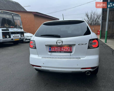 Білий Мазда СХ-7, об'ємом двигуна 2.2 л та пробігом 243 тис. км за 10999 $, фото 12 на Automoto.ua