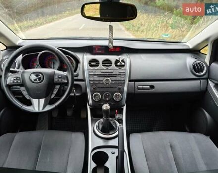 Белый Мазда СХ-7, объемом двигателя 2.18 л и пробегом 168 тыс. км за 10600 $, фото 28 на Automoto.ua