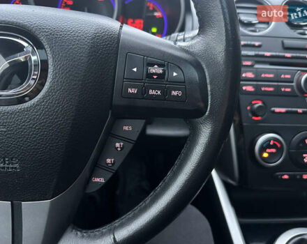 Білий Мазда СХ-7, об'ємом двигуна 2.2 л та пробігом 243 тис. км за 10999 $, фото 48 на Automoto.ua