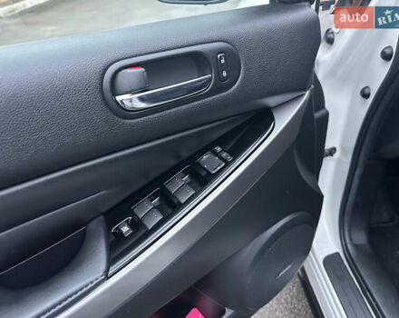 Білий Мазда СХ-7, об'ємом двигуна 2.2 л та пробігом 243 тис. км за 10999 $, фото 26 на Automoto.ua