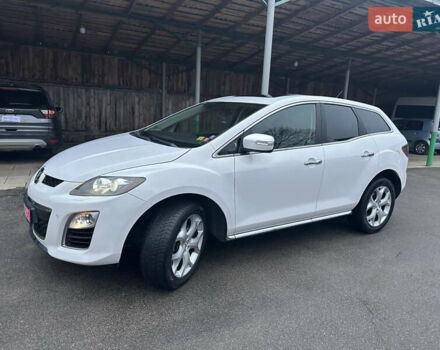 Білий Мазда СХ-7, об'ємом двигуна 2.2 л та пробігом 243 тис. км за 10999 $, фото 21 на Automoto.ua