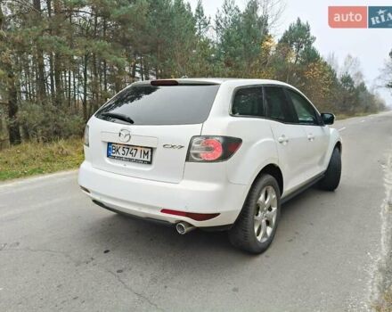 Белый Мазда СХ-7, объемом двигателя 2.18 л и пробегом 168 тыс. км за 10600 $, фото 4 на Automoto.ua